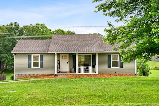 716 Ashwood Dr, Clarksville, TN 37043 - cape cod-style house with covered porch, roof with shingles, and a front lawn