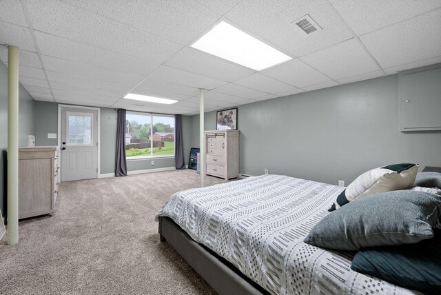 716 Ashwood Dr, Clarksville, TN 37043 - bedroom with carpet, a paneled ceiling, and baseboards