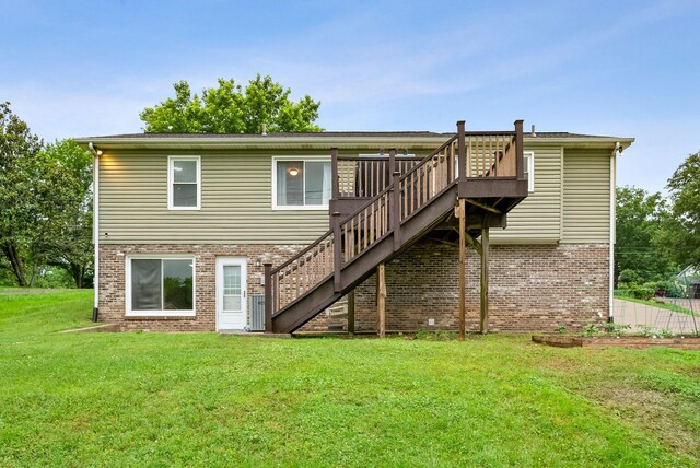 716 Ashwood Dr, Clarksville, TN 37043 - rear view of property with stairs, brick siding, a yard, and a deck