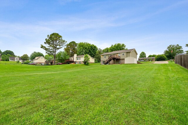 716 Ashwood Dr, Clarksville, TN 37043 - view of yard featuring stairway and a deck