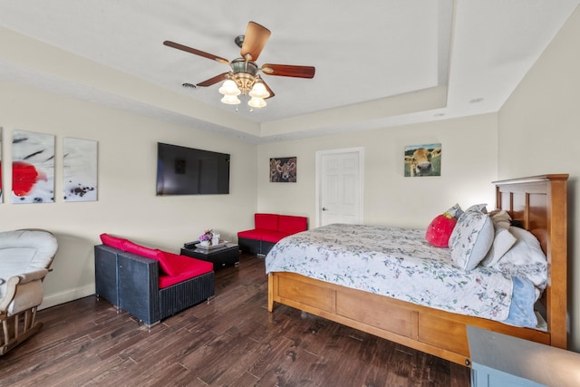 4484 N Pinson Rd, Portland, TN 37148 - bedroom with a raised ceiling, wood finished floors, ceiling fan, and baseboards