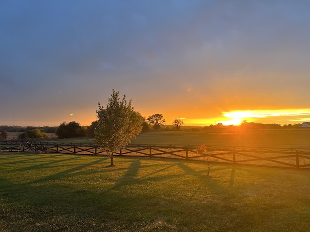 4484 N Pinson Rd, Portland, TN 37148 - yard at dusk featuring a lawn and a view of rural / pastoral area
