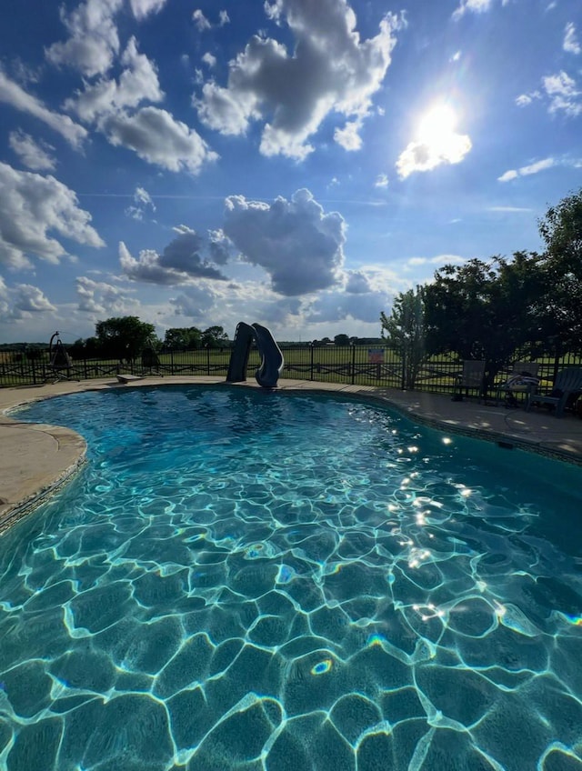 4484 N Pinson Rd, Portland, TN 37148 - view of pool featuring a water slide and fence
