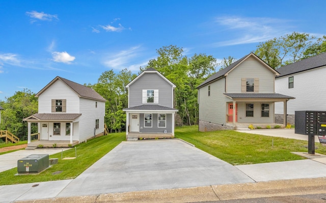view of front of property with covered porch and a front yard