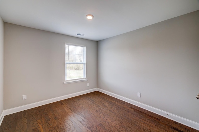 251 Grandstand Blvd, Gallatin, TN 37066 - unfurnished room featuring baseboards and dark wood-type flooring