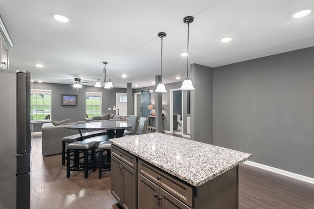 145 Diane Loop, White Bluff, TN 37187 - kitchen featuring freestanding refrigerator, open floor plan, baseboards, dark wood-style floors, and recessed lighting