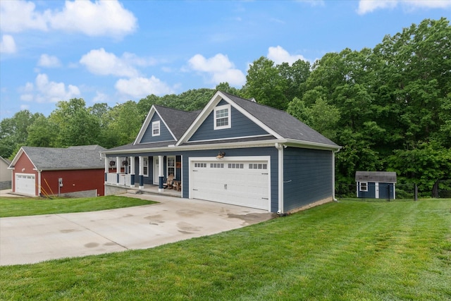 145 Diane Loop, White Bluff, TN 37187 - view of front of house with covered porch, a front yard, driveway, and an outdoor structure