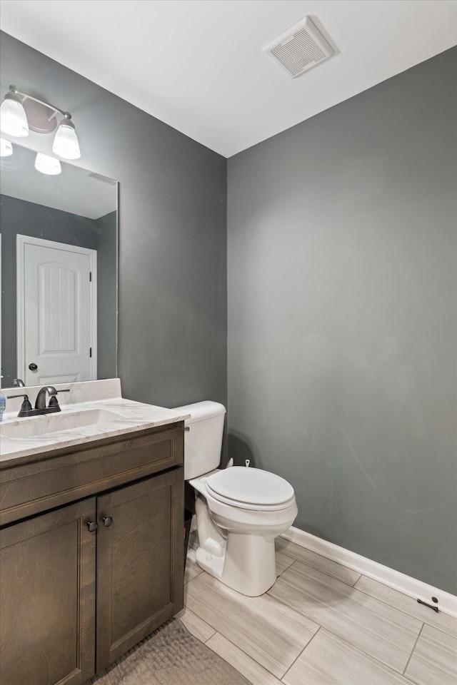 145 Diane Loop, White Bluff, TN 37187 - half bath with toilet, vanity, and baseboards