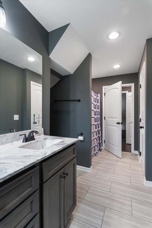 145 Diane Loop, White Bluff, TN 37187 - bathroom featuring baseboards, vanity, recessed lighting, and a shower with shower curtain