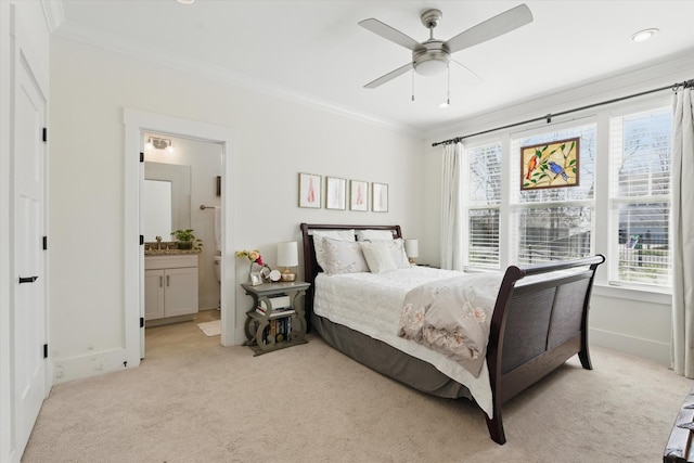 bedroom with light carpet, ornamental molding, multiple windows, and baseboards
