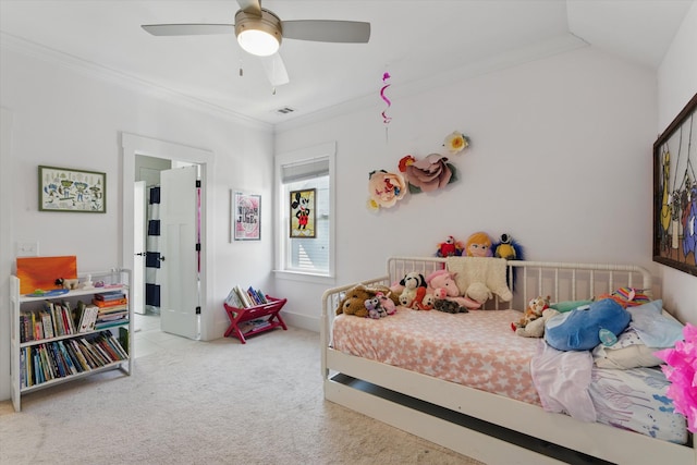 bedroom featuring carpet flooring, crown molding, and a ceiling fan
