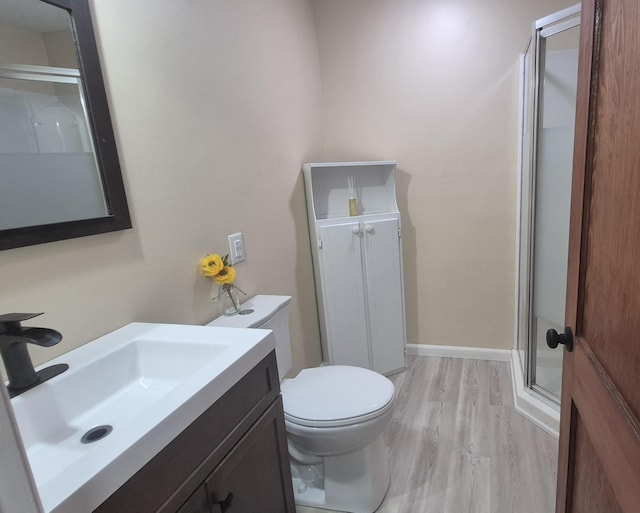 525527 Shady Grove Rd, Sequatchie, TN 37374 - bathroom featuring a shower stall, wood finished floors, vanity, and toilet