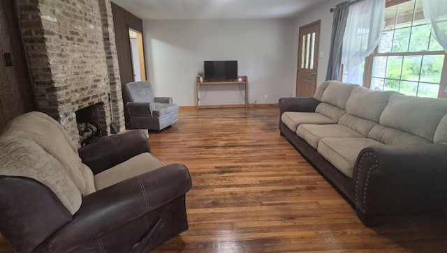 525527 Shady Grove Rd, Sequatchie, TN 37374 - living room with wood finished floors, baseboards, and a fireplace