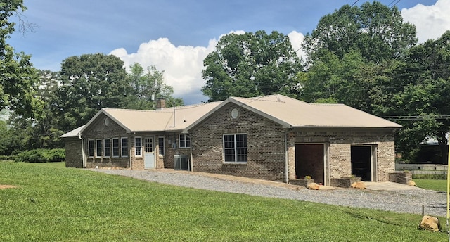 525527 Shady Grove Rd, Sequatchie, TN 37374 - back of property featuring brick siding, a lawn, and cooling unit