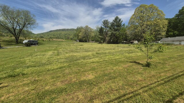 525527 Shady Grove Rd, Sequatchie, TN 37374 - view of grassy yard featuring a view of countryside and a mountain view