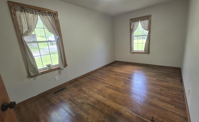 525527 Shady Grove Rd, Sequatchie, TN 37374 - spare room with plenty of natural light, dark wood-style flooring, and baseboards