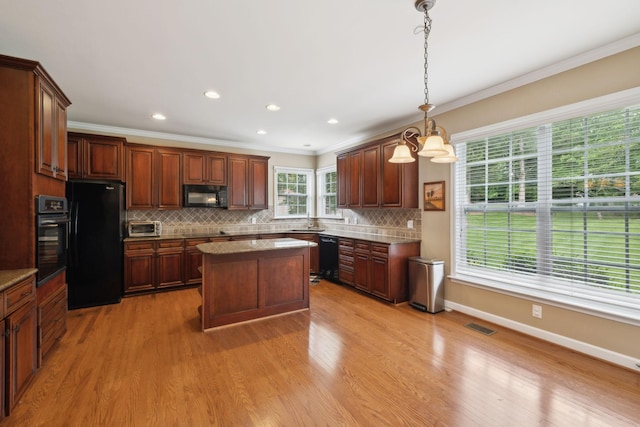 2041 Valley Brook Dr, Brentwood, TN 37027 - kitchen with black appliances, ornamental molding, light wood-type flooring, a sink, and tasteful backsplash