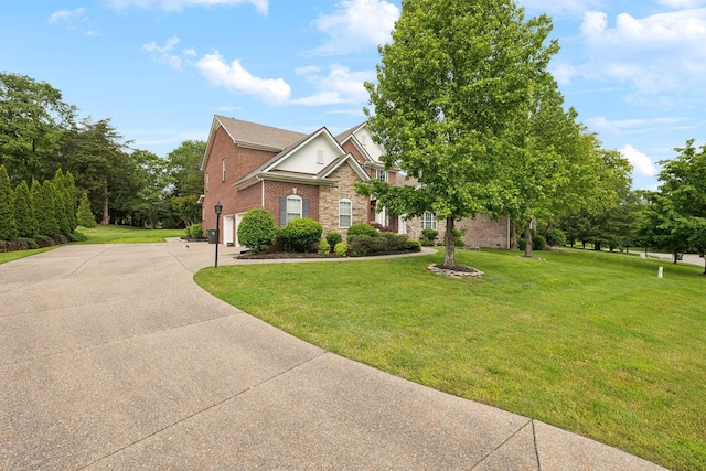 2041 Valley Brook Dr, Brentwood, TN 37027 - traditional-style home with an attached garage, driveway, a front lawn, and brick siding