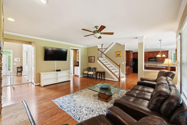 2041 Valley Brook Dr, Brentwood, TN 37027 - living area with ceiling fan, wood finished floors, stairway, ornamental molding, and baseboards