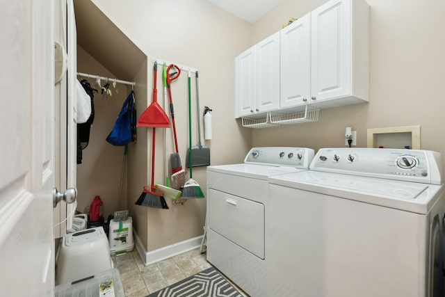 2041 Valley Brook Dr, Brentwood, TN 37027 - laundry room featuring washing machine and clothes dryer, cabinet space, and baseboards