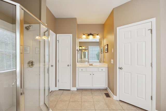 2041 Valley Brook Dr, Brentwood, TN 37027 - bathroom with a stall shower, vanity, tile patterned floors, and baseboards