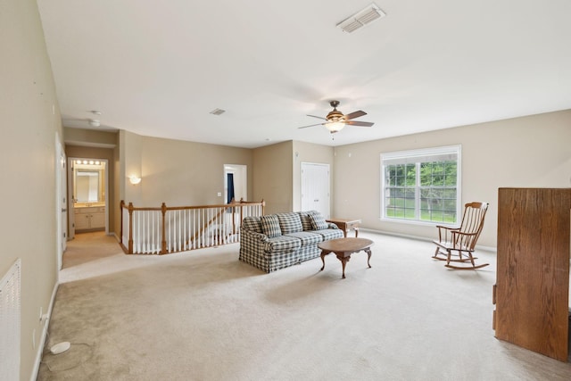 2041 Valley Brook Dr, Brentwood, TN 37027 - living room featuring light carpet, ceiling fan, and baseboards