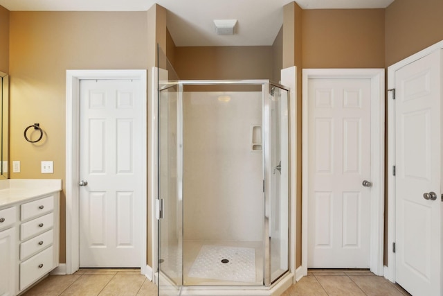 2041 Valley Brook Dr, Brentwood, TN 37027 - full bath with tile patterned floors, a stall shower, and vanity
