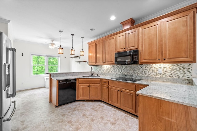 kitchen featuring black appliances, a peninsula, a sink, backsplash, and ornamental molding