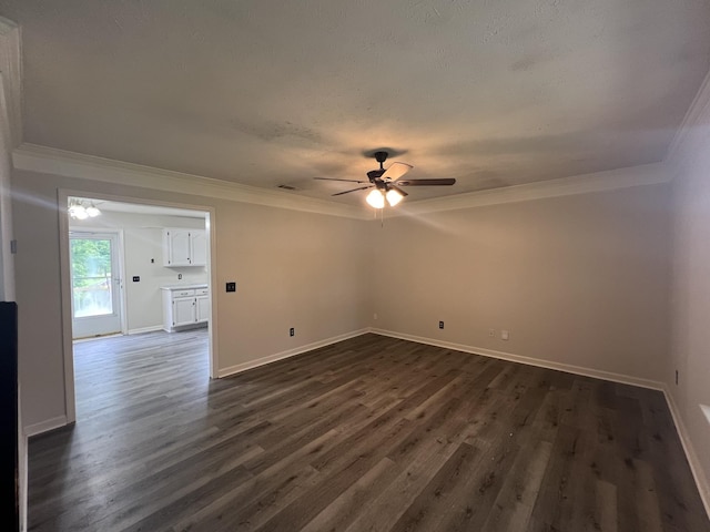 105 Vernon Traylor Dr, Smyrna, TN 37167 - spare room with ceiling fan, ornamental molding, dark wood-style flooring, and baseboards