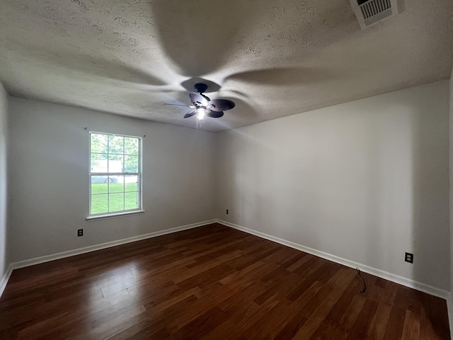 105 Vernon Traylor Dr, Smyrna, TN 37167 - empty room featuring ceiling fan, baseboards, dark wood-style flooring, and a textured ceiling