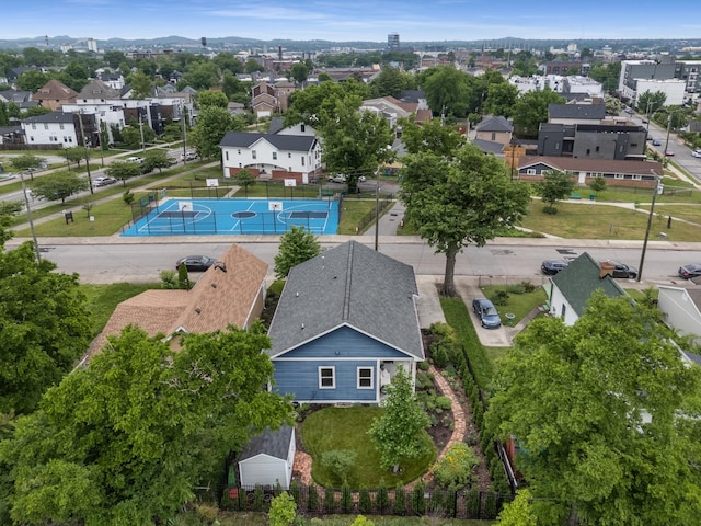 aerial view of residential area featuring a mountain backdrop