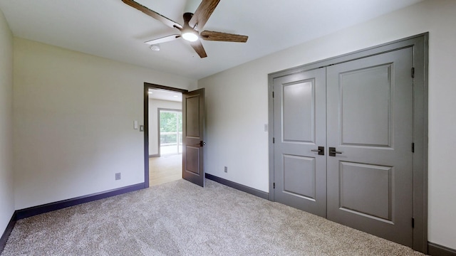 2038 Ogburn Chapel Rd, Clarksville, TN 37042 - unfurnished bedroom with carpet flooring, baseboards, a closet, and ceiling fan