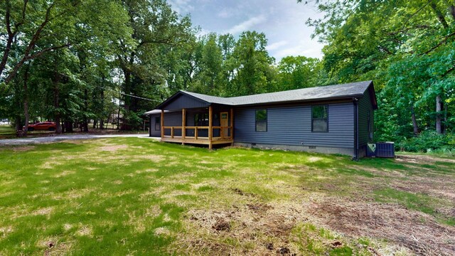 2038 Ogburn Chapel Rd, Clarksville, TN 37042 - back of house with crawl space, a yard, a wooden deck, and cooling unit