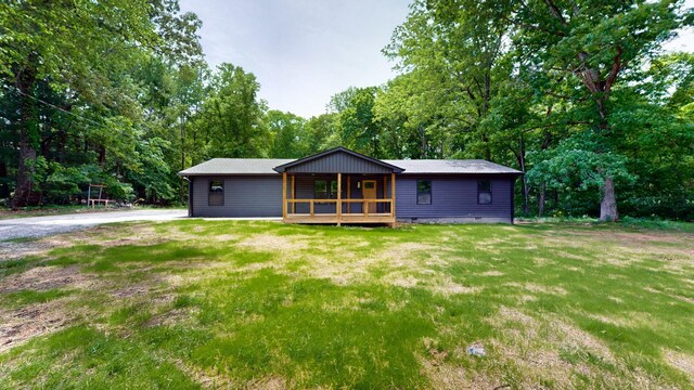 2038 Ogburn Chapel Rd, Clarksville, TN 37042 - back of house with a lawn and covered porch