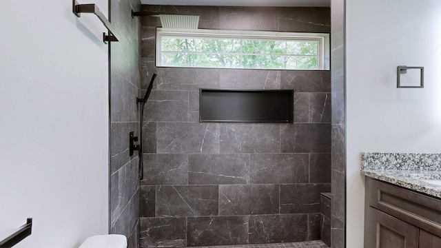 2038 Ogburn Chapel Rd, Clarksville, TN 37042 - full bath featuring tiled shower, vanity, and healthy amount of natural light