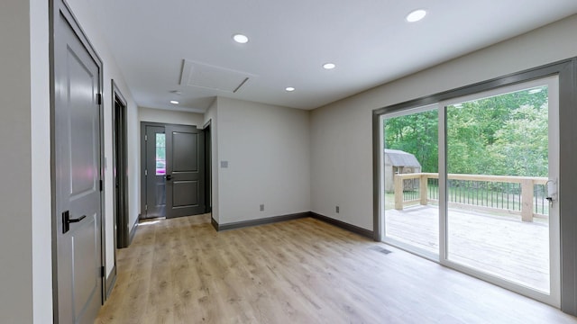 2038 Ogburn Chapel Rd, Clarksville, TN 37042 - empty room with light wood-style floors, recessed lighting, baseboards, and attic access