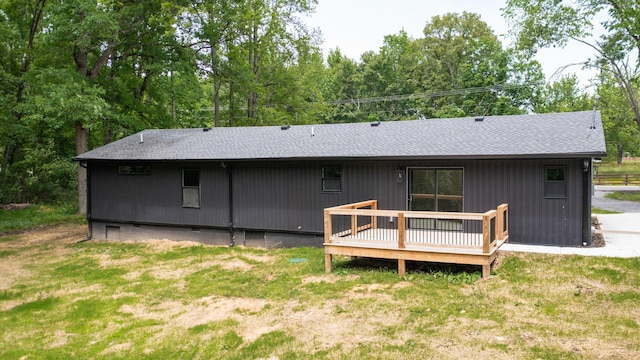 2038 Ogburn Chapel Rd, Clarksville, TN 37042 - rear view of property featuring a deck, a shingled roof, a yard, and crawl space
