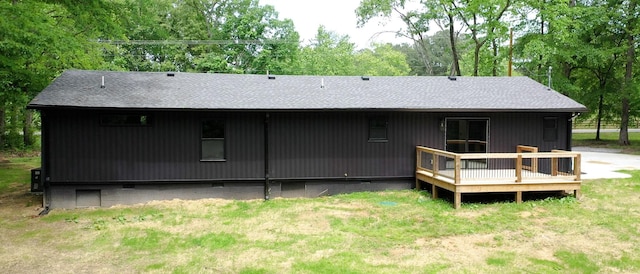 2038 Ogburn Chapel Rd, Clarksville, TN 37042 - rear view of property with roof with shingles, crawl space, a wooden deck, and view of scattered trees