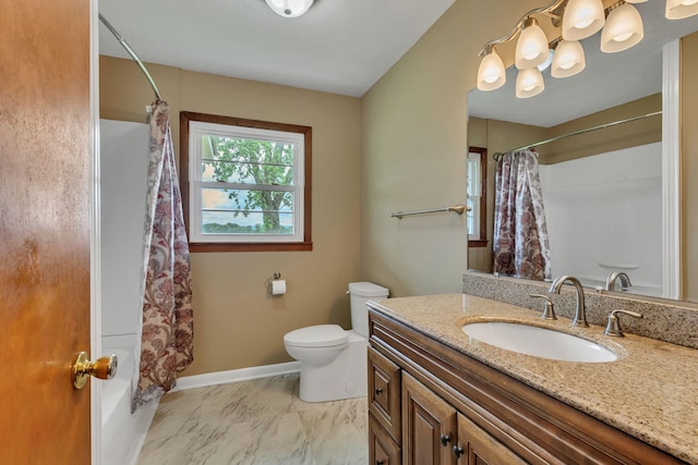 full bathroom with marble look tiles, a shower with curtain, toilet, vanity, and baseboards