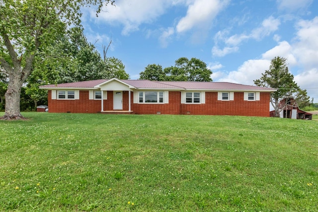 single story home with brick siding, a front yard, metal roof, and crawl space