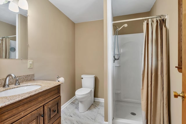 bathroom featuring marble look tiles, a shower stall, vanity, and toilet