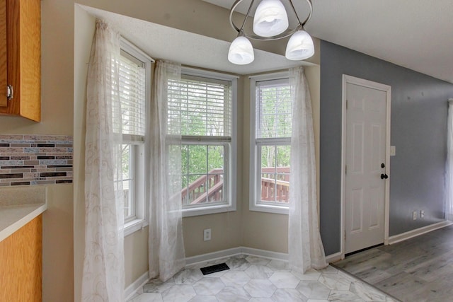 entrance foyer featuring baseboards