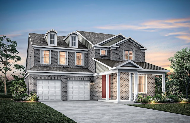 view of front facade featuring a garage, driveway, and brick siding