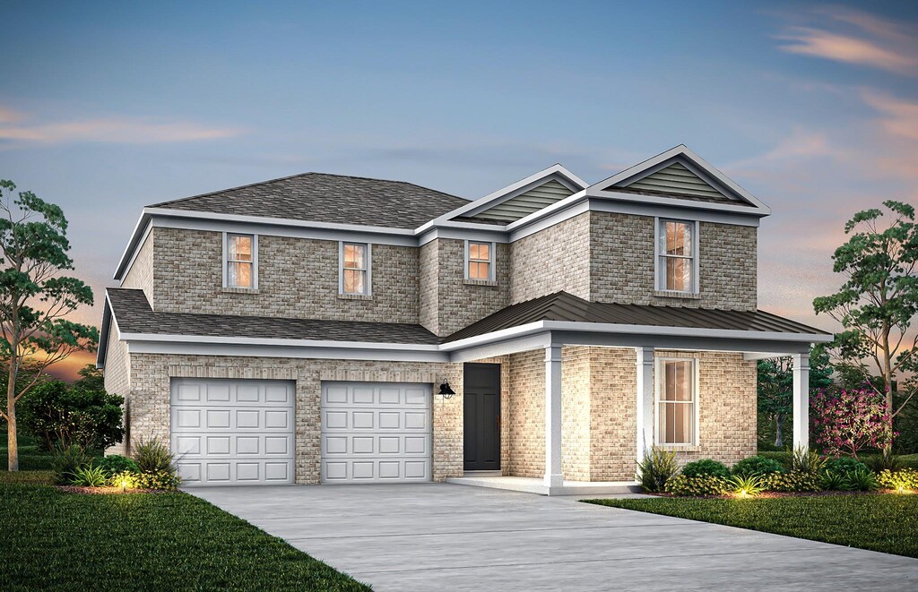 205 Ash Dl, Mount Juliet, TN 37122 - view of front of house with a garage, driveway, and brick siding