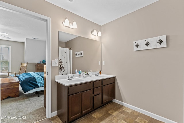 516 Trainmaster Dr, Maryville, TN 37804 - bathroom with ensuite bathroom, baseboards, and double vanity