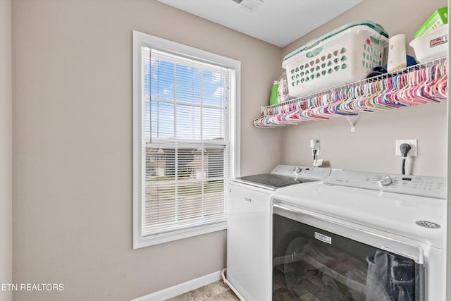 516 Trainmaster Dr, Maryville, TN 37804 - laundry room featuring washing machine and clothes dryer and baseboards