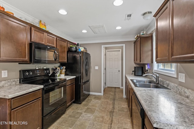 516 Trainmaster Dr, Maryville, TN 37804 - kitchen featuring black appliances, a sink, crown molding, light countertops, and baseboards