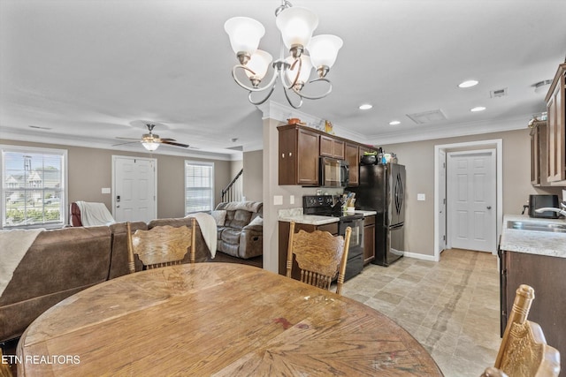 516 Trainmaster Dr, Maryville, TN 37804 - dining room featuring ornamental molding, stairway, plenty of natural light, a chandelier, and recessed lighting