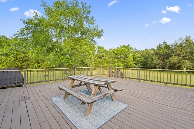 3630 W Trimble Rd, Milton, TN 37118 - wooden deck featuring outdoor dining space and a lawn