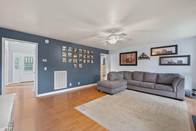 3630 W Trimble Rd, Milton, TN 37118 - living room with wood finished floors, a ceiling fan, and baseboards